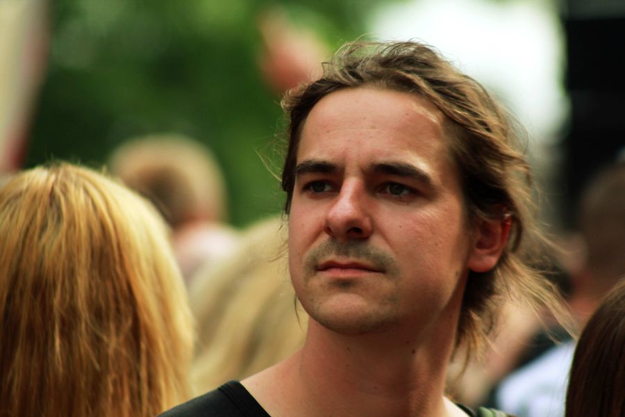 Relaxed Man in a Crowd